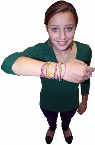 Girl with LOTS of Silly Bands